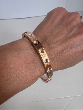 Crystal and rose gold bangle bracelet